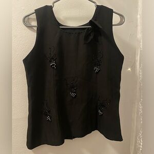 Formal black sleeveless top